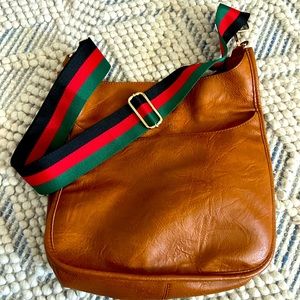 Ahdorned bag with strap